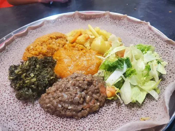 Doro Wot - Traditional Ethiopian chicken stew at Horeb Restaurant Calgary